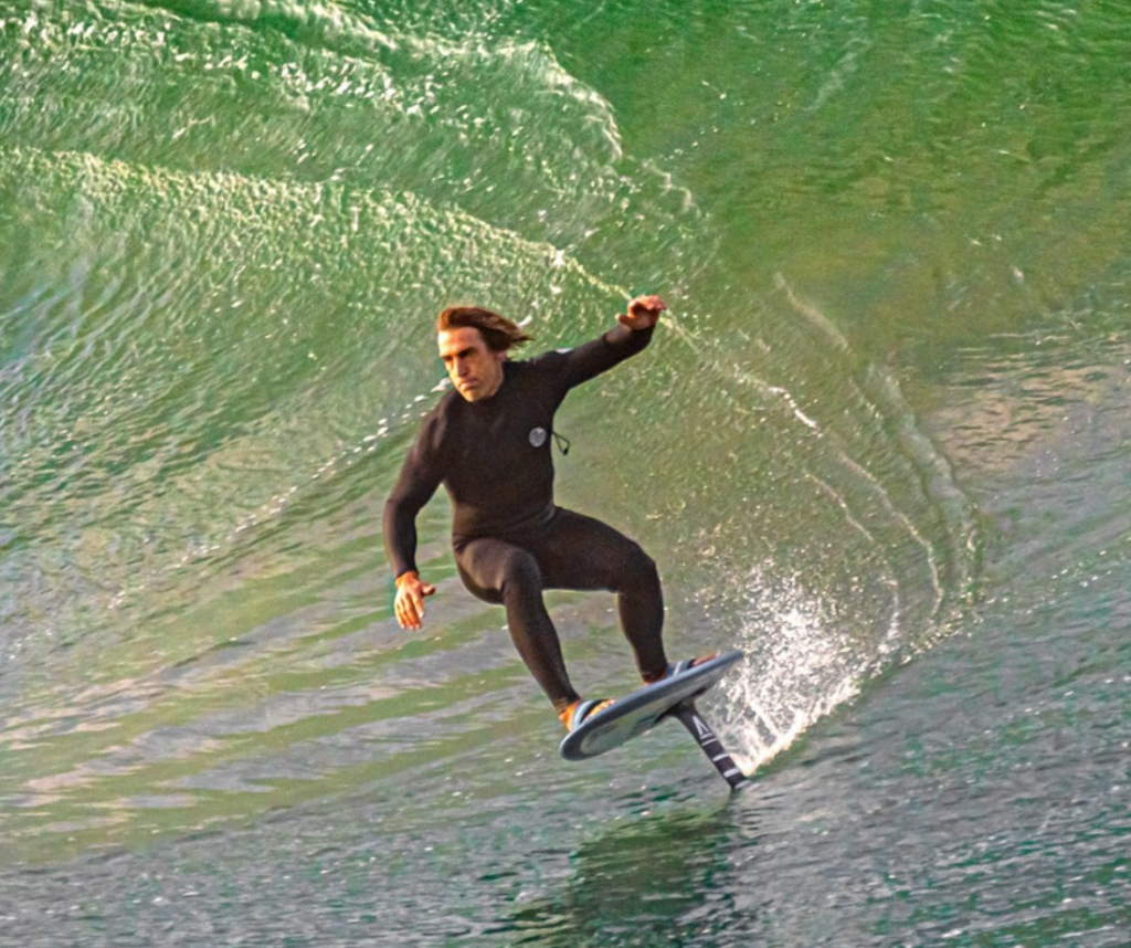 person surfing on a foil board